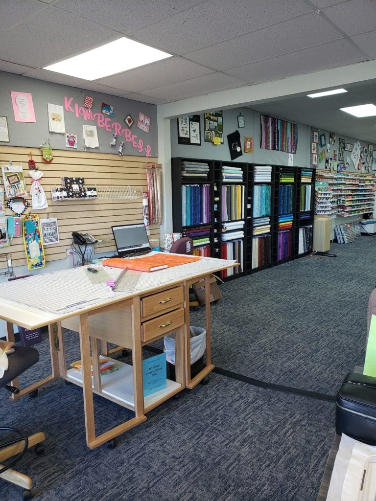 Get Sew Organized Challenge for January 2020: Fabric 11 Photo of cutting area at RMSV Aurora store