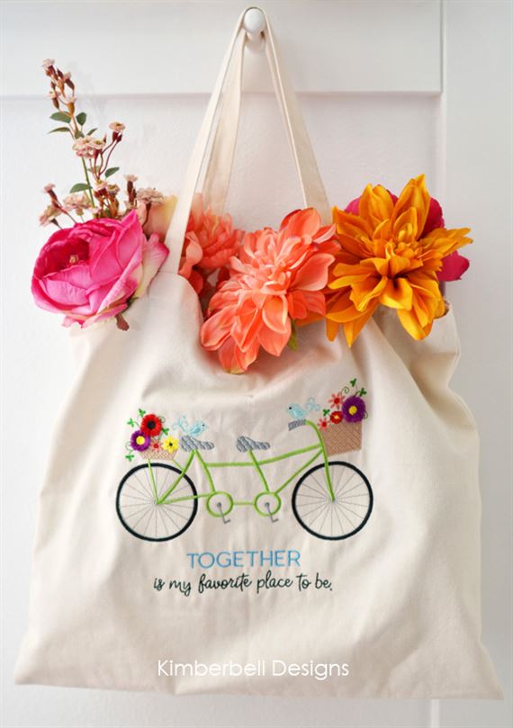 Photo of tandem bicycle embroidery made at Kimberbell club at Littleton RMSV