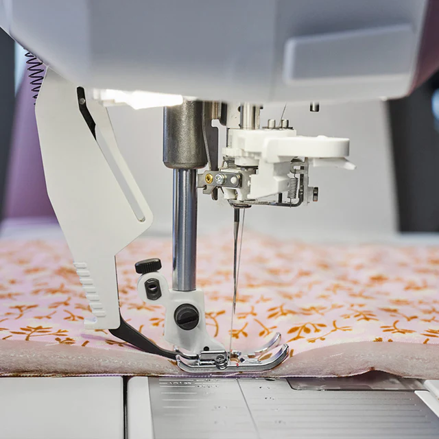 HUSQVARNA® VIKING® EPIC QUILT™ 97 Sewing Machine & Accessories Bundle Exceptional Fabric Feeding with Integrated Dual Feed Technology
