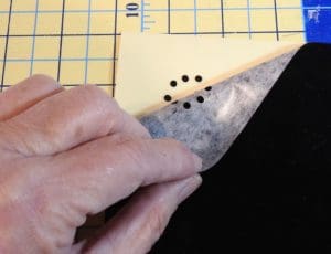 Put a Little Bling on Your Embroidery. The Brother Rhinestone Kit, Part 2. 48 Photo of template sheet from Brother Rhinestone Kit with holes cut for rhinestones. and hole centers still attached to backing sheet