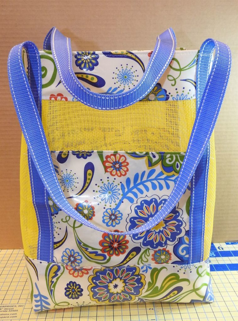 Photo of completed vinyl mesh tote example for 100th blog post