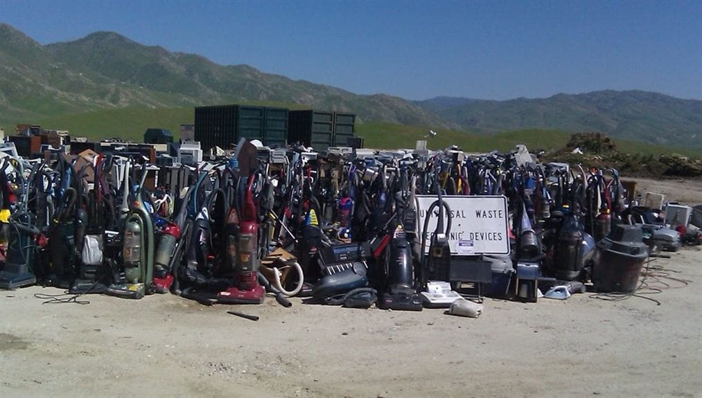 It's In the Bag! Allergy Sufferers, Get a Bagged Vacuum Cleaner! 13 Photo of numerous vacuum cleaners at a dump site