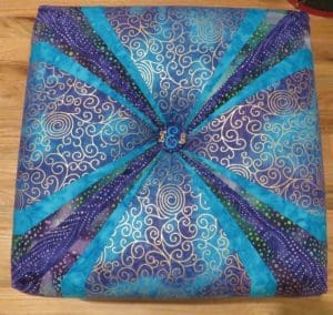 Little Miss Muffet is Making a Square Tuffet 33 Purple and teal square tuffet