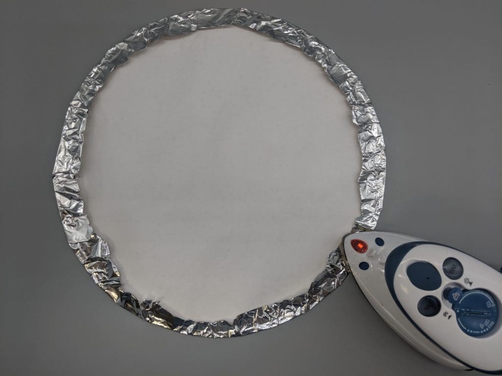 Turned Edge Appliqué 13 Photo of ironing edge of folded edge of circle for turned edge applique