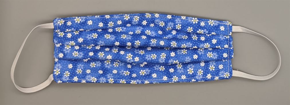 Photo of completed cotton face mask after topstitching