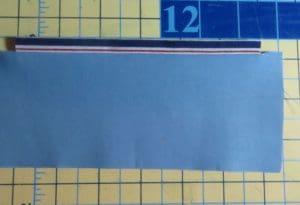 In a Bind About Binding? Three Ways to Cut Fabric Binding Strips 3 Photo of fabric binding cut straight grain and attached to a straight piece of fabric