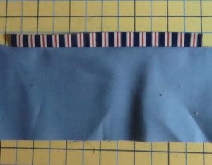 In a Bind About Binding? Three Ways to Cut Fabric Binding Strips 5 Photo of fabric binding cut cross grain and attached to a straight piece of fabric