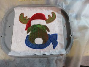 Shiny and Bright: A Mylar Embroidery Christmas Moose 13 Photo of Christmas Moose with Mylar embroidery for antlers, hat and scarf and head