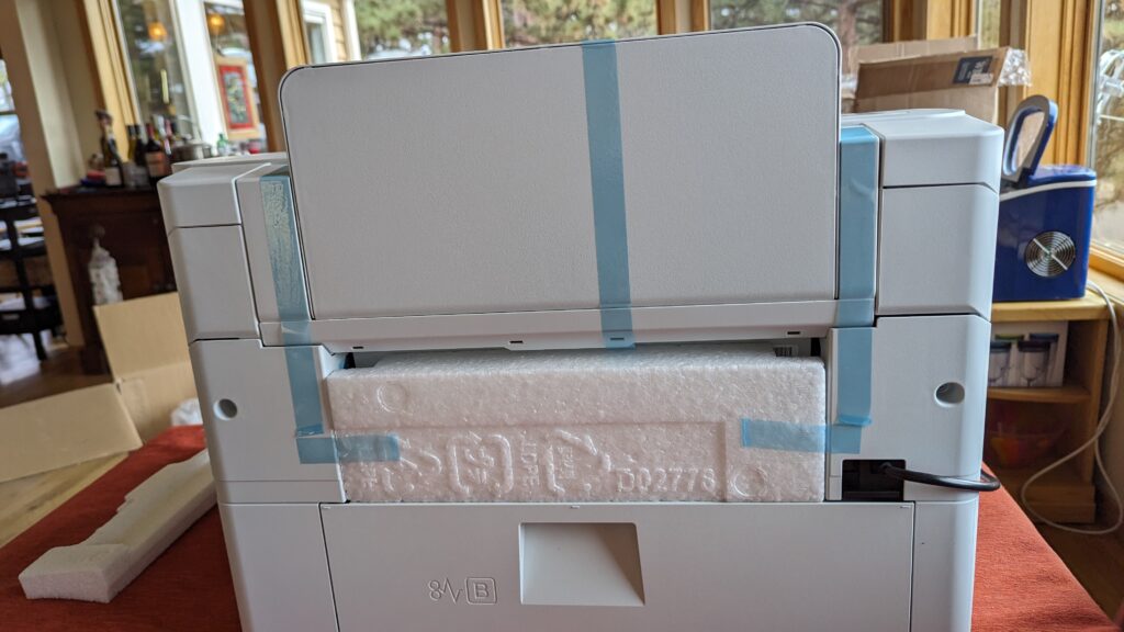 Blue tape protecting elements of the printer