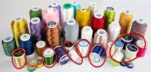 Handi Quilter Event: The Basics, Tips and Tricks I Learned 5 Photo of cross and stack wound thread.