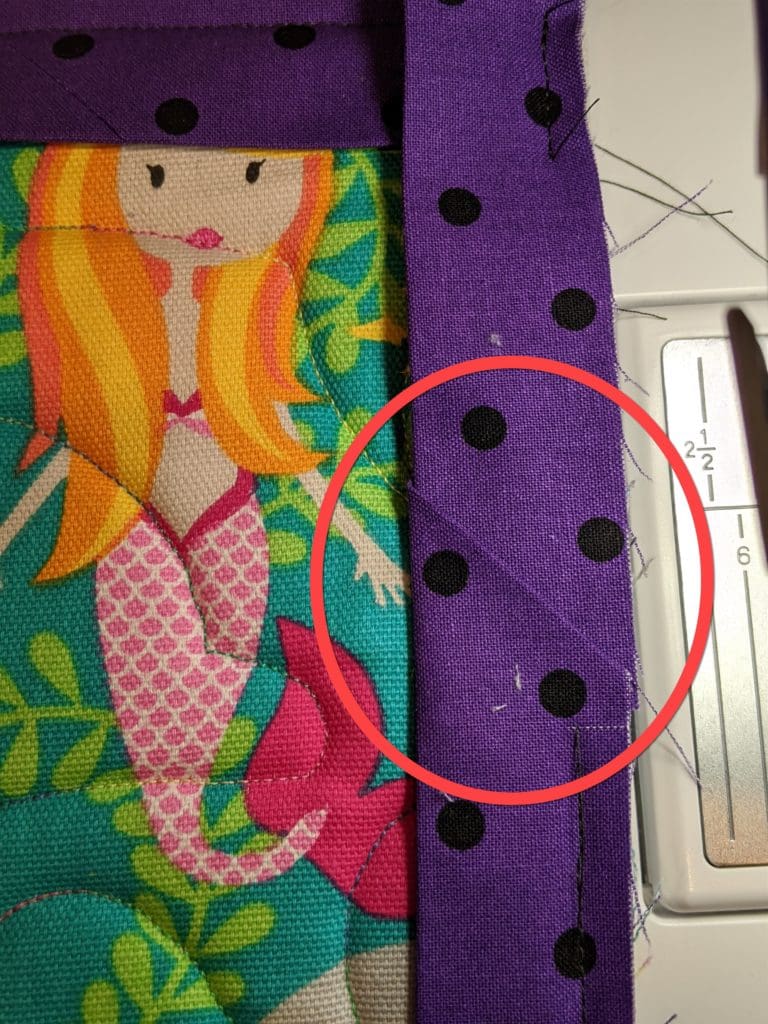 Got Yourself in a Bind? Learn How to Join Binding Ends 10 Binding tucked in fold created at the binging beginning